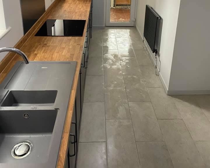 Grey floor tiles installed in a kitchen in Southampton